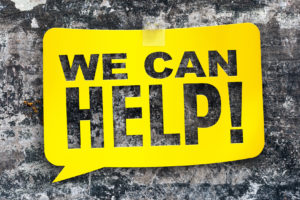 "we can help" yellow banner on the background of the texture. De